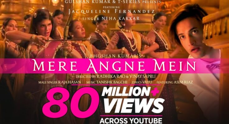 Mere Angne Mein Is A Song By Neha Kakkar, Raja Hasan. Lyrics Are Penned By Vayu While Music Is Produced By Radhika Rao. Official Music Video Is Released On Official Channel.